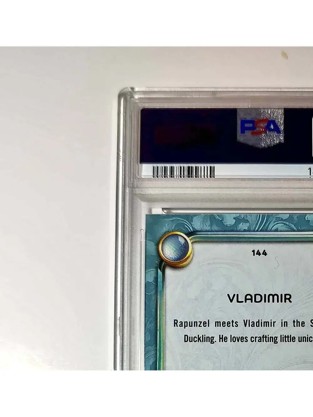 Vladimir 2025 Topps Disney Wonder #144 Diamond Card Tangled PSA 7